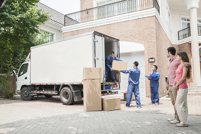 Movers loading moving truck
