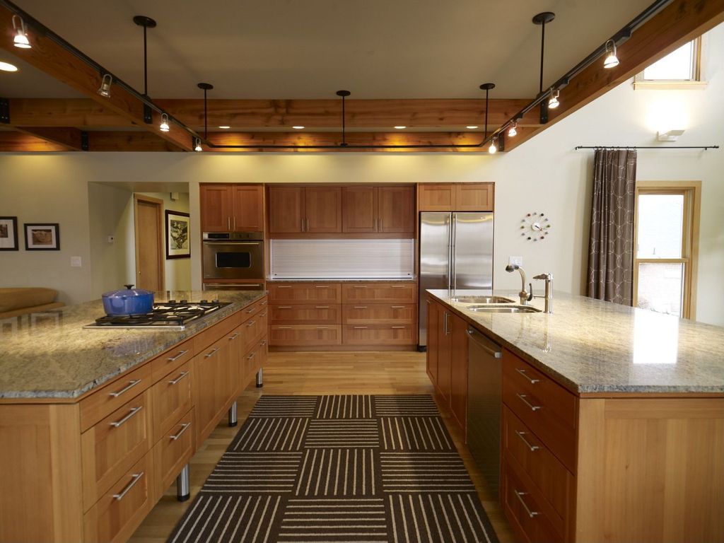 Modern Craftsman style kitchen with area rug.
